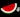 A digital drawing of a watermelon slice on a black background