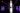 A microphone stood in an empty church hall.
