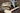 image of driftwood and feather sail boat examples